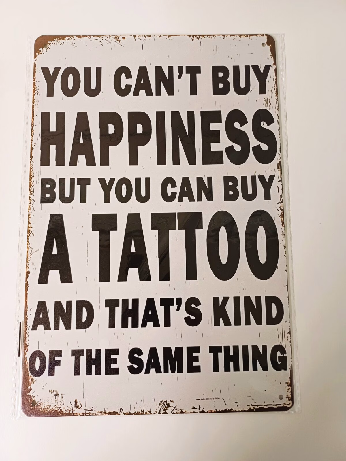 metalen bord you can't buy happiness but you can buy a tattooo 1 metalen bord you can't buy happiness but you can buy a tattooo