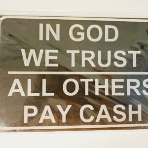 metalen bord in god we trust